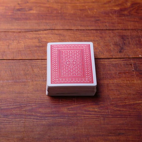Deck of cards on wooden table — Stock Photo, Image