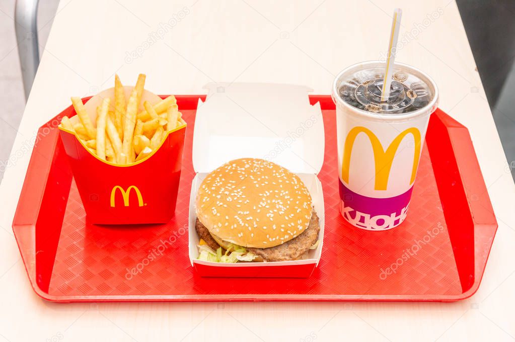 Moscow, Russia, March 15 2018: McDonalds Big Mac hamburger menu, French Fries and Coca Cola.