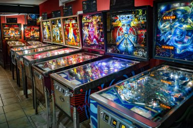 Budapest, Hungary - March 25, 2018: Pinball museum. Pinball table close up view of vintage machine clipart