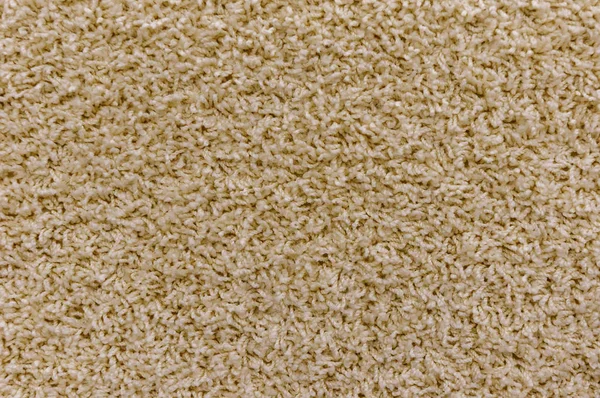 Zbliżenie: lekki brązowy dywan tekstura tło w sali konferencyjnej — Zdjęcie stockowe