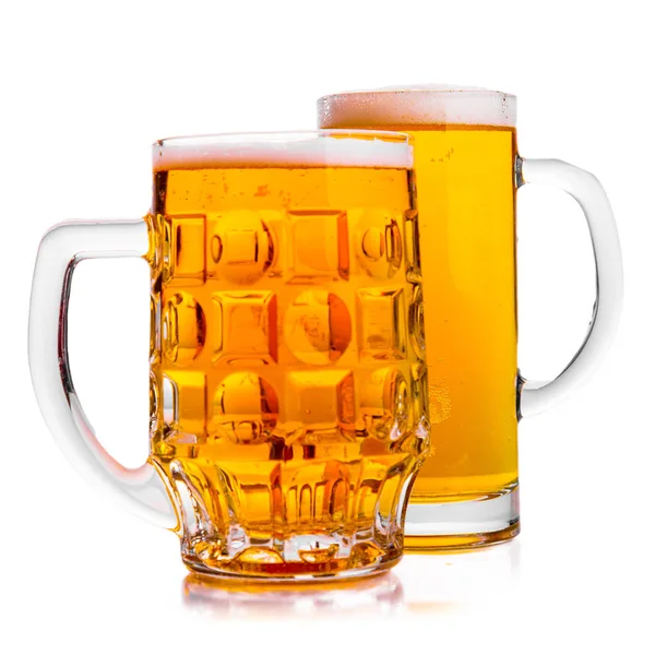 Two Mugs of fresh beer with cap foam — Stock Photo, Image