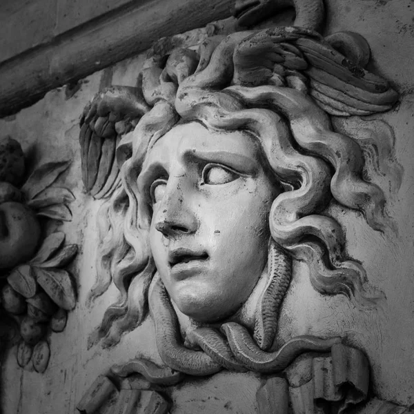 Head with wreath detail of the ancient sculpture — Stock Photo, Image