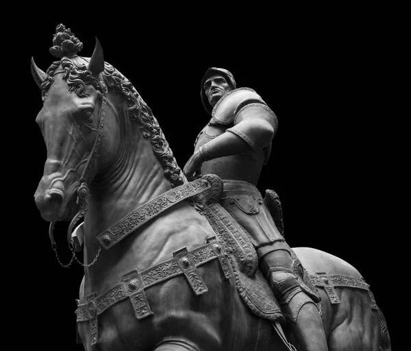 Sculpture of man on a horse isolated on black — Stock Photo, Image