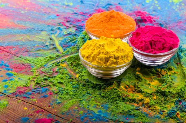 Holi color powder. Organic Gulal colours in bowl for Holi festival, Hindu tradition festive. Bright vibrant pigment closeup — Stock Photo, Image