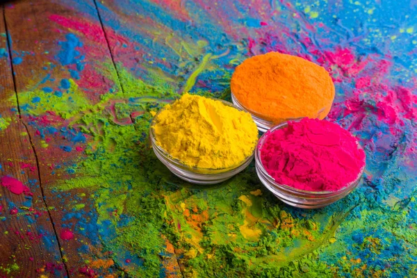 Holi color powder. Organic Gulal colours in bowl for Holi festival, Hindu tradition festive. Bright vibrant pigment closeup — Stock Photo, Image