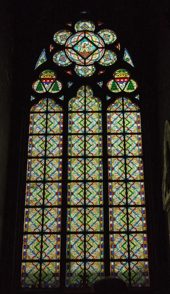 Paris, France, March 27, 2017: Stained glass window at Notre Dame cathedral. Notre Dame church is one of the top tourist attractions in Paris. Inside the old Gothic landmark of Paris — Stock Photo, Image