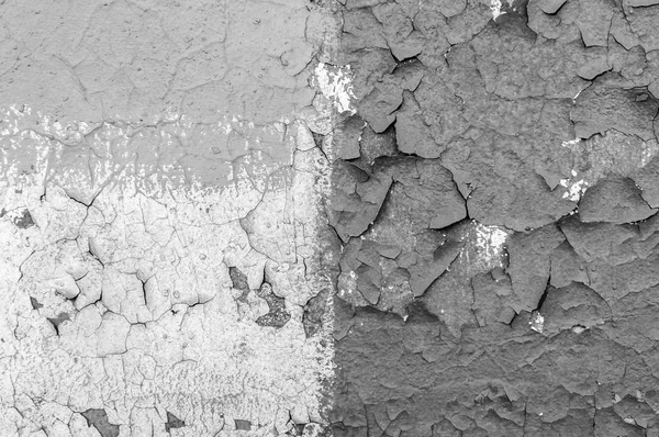 水泥墙上的旧油漆裂开了。在墙上剥落油漆的质地。质朴的蓝色呼噜材料图案 — 图库照片