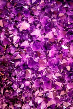 Amethyst purple crystal. Mineral crystals in the natural environment. Texture of precious and semiprecious gemstone clipart