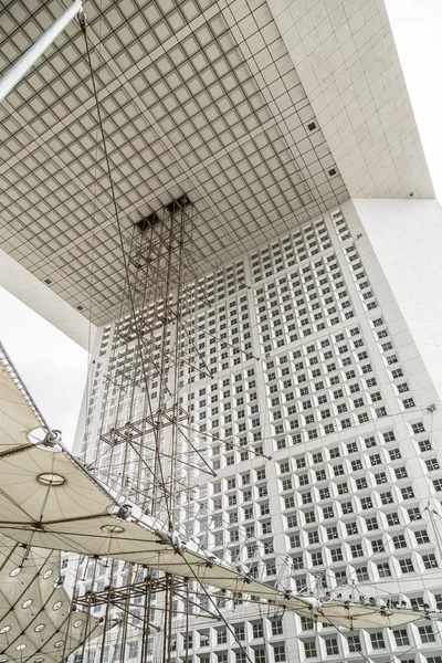 Paris, France, March 30, 2017: Grande Arche in La Defense with unidentified people in Paris. Its Europes largest business district with 560 ha area, 72 glass and steel buildings and skyscrapers — Stock Photo, Image