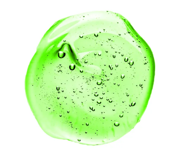 Косметичний крем Сироватковий гель текстури ізольовані на білому тлі. Близько до зеленої прозорої краплі продукту по догляду за шкірою. Висока якість — стокове фото