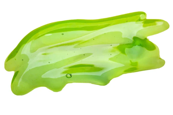 Косметична текстура крем-гелю ізольована на білому тлі. Близько до зеленої прозорої краплі продукту по догляду за шкірою. Висока якість Ліцензійні Стокові Зображення