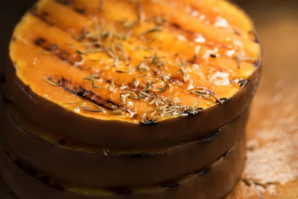 Pumpkin slices grilled with herbs