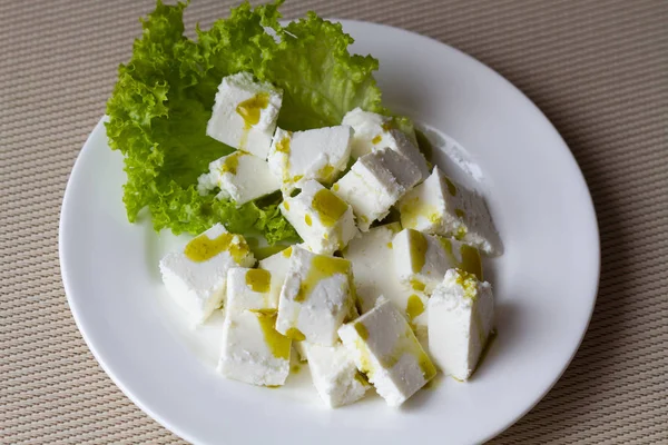 Fatias de queijo feta com azeite — Fotografia de Stock