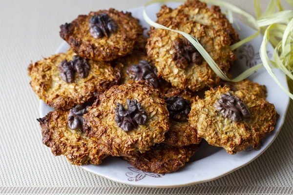 Baked oat cookies with a walnuts — Stock Photo, Image