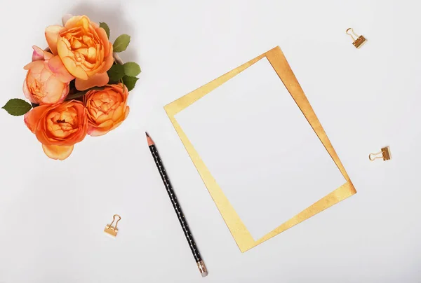 Roses and blank paper top view. — Stock Photo, Image