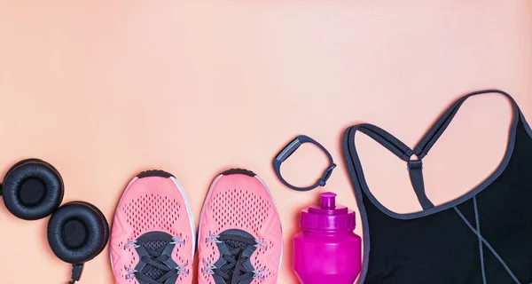 Banner format photo with fitness clothes and accessories on bright background