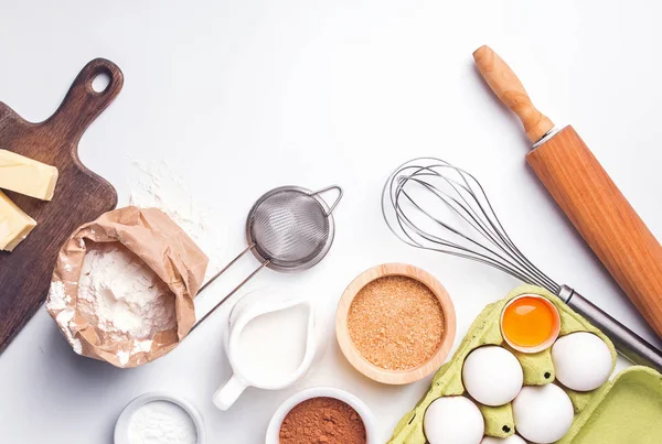 Baking ingredients and items on the white background — Stock Photo, Image