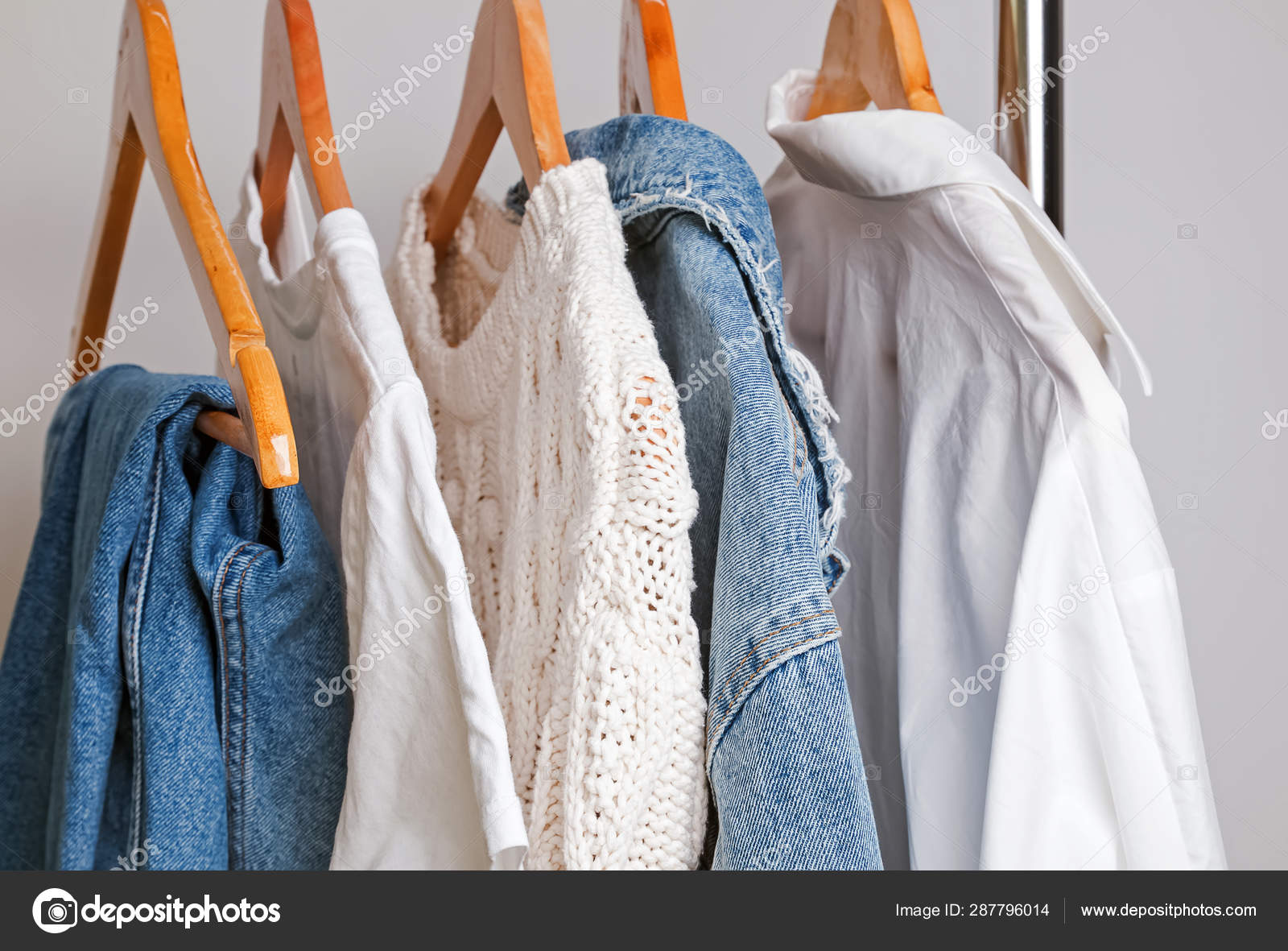 Woman Minimalist Wardrobe In White And Denim Stock Photo