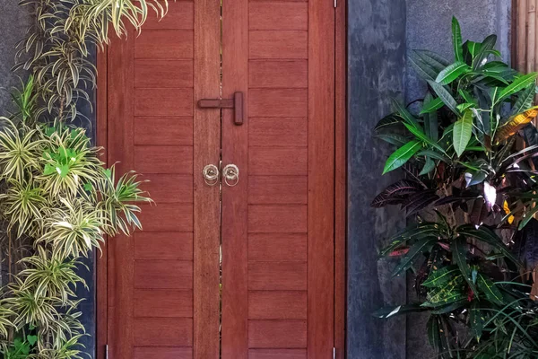 Entrance door to the villa with garden