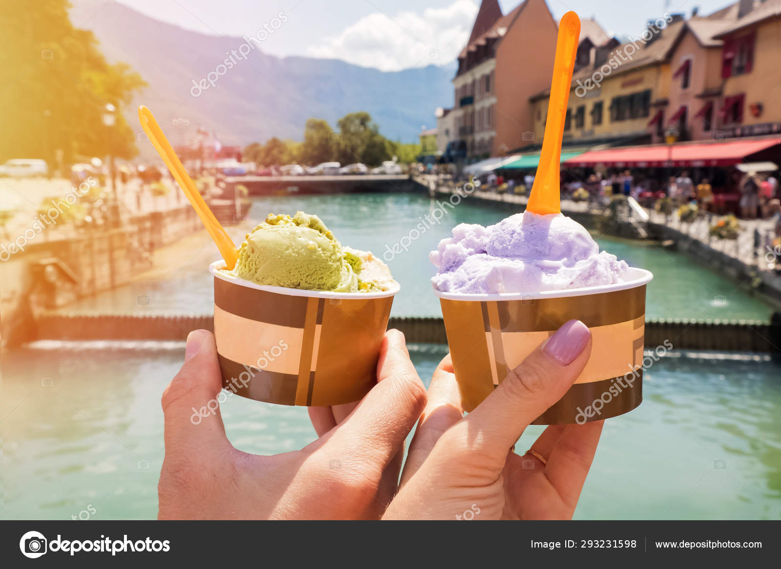 Man And Woman Hands Holding Sweet Delicious Ice Cream Close Up On The Background Of European City Stock Photo Image By C Chiociolla Man And Woman Hands Holding Sweet Delicious Ice Cream Close Up On The Background Of European City Stock Photo Image By C Chiociolla