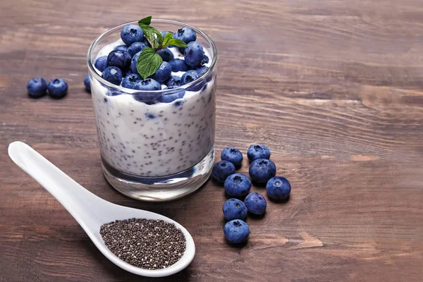 Chia pudding in a glass with fresh blueberries and mint — Stock Photo, Image