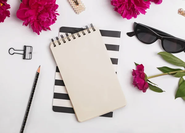 Creative summer flat lay with peonies and feminine accessories, top view — Stock Photo, Image