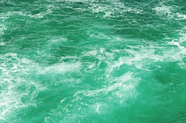 Deniz dalgaları yakın-up pastel yeşil veya neo nane rengi tonda