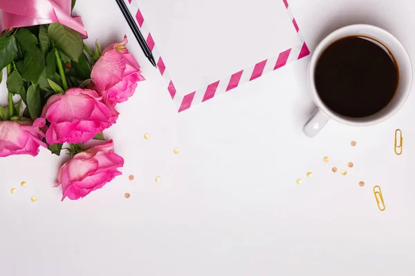 Creative composition with roses, coffee and paper on white background — Stock Photo, Image