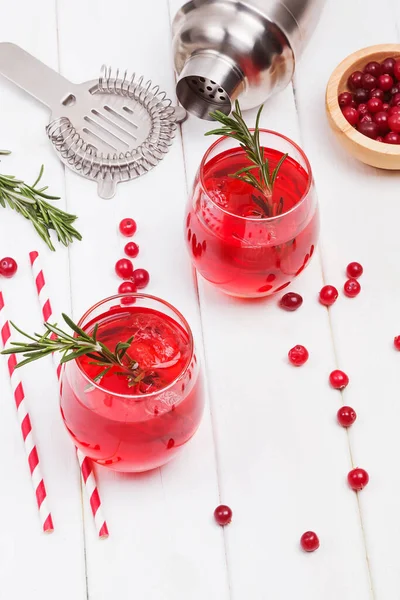 Two Glasses Cranberry Cocktail Rosemary White Table Top View — Stock Photo, Image