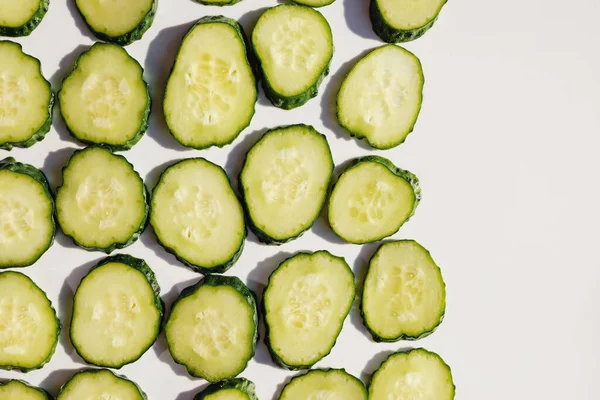Fresh cucumber slices on white background — Stock Photo, Image