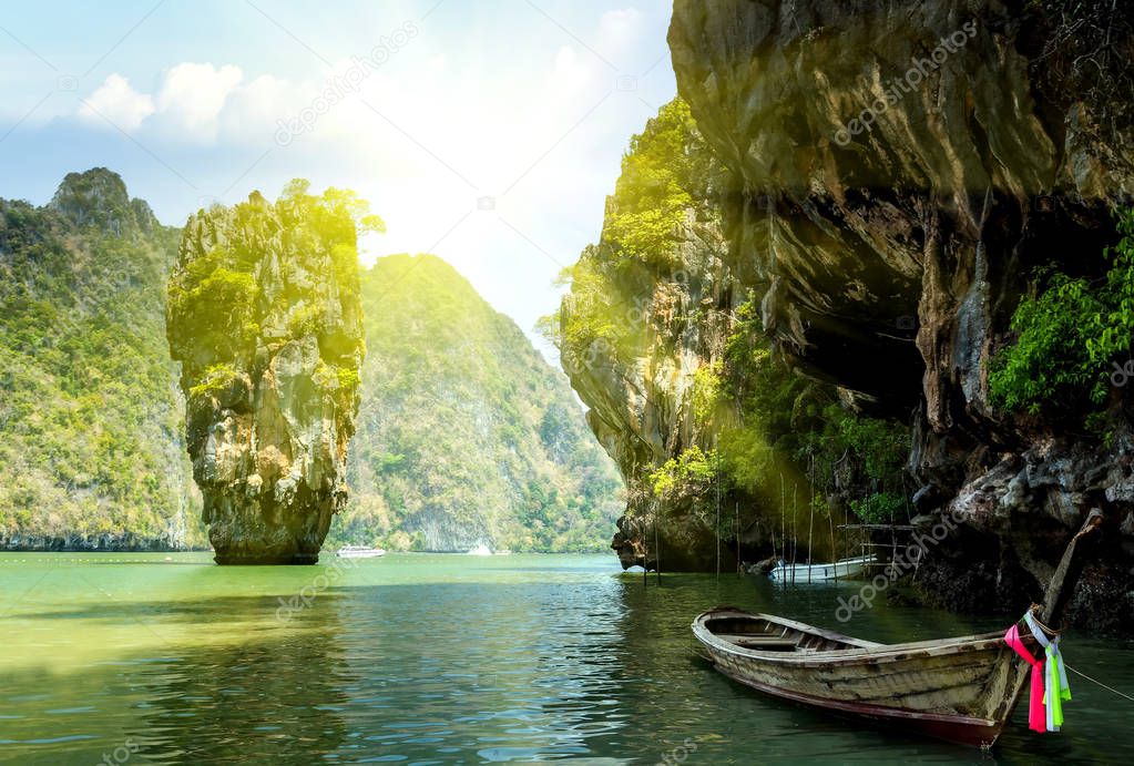 Tropical summer sunset scene cliff James Bond island, Khao Phing Kan Pang Nga bay. Thailand