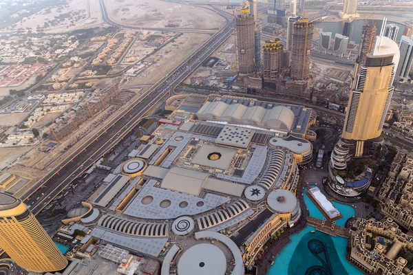 The Dubai Shopping Mall top view, Grove Musical Fountain artificial lake, Aerial view of downtown hotel, famous The Dubai Mall, United Arab Emirates (UAE).