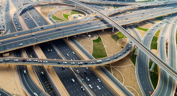 Aerial view bridge of highway traffic interchange of a Cityscape. Transport junction traffic road with vehicle movement aerial view. Background scenic road.