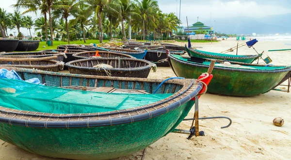 Corackle boat - Pham Van Dong Beach, Viet Nam Motorized Vietnamese fishing baskets boats in Da Nang coast landscape of Vietnam