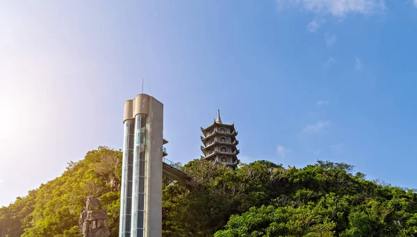 Passenger elevator lift top Marble Mountains are actually a series of five marble and limestone formations, which the locals liken to the shape of a dragon at rest.