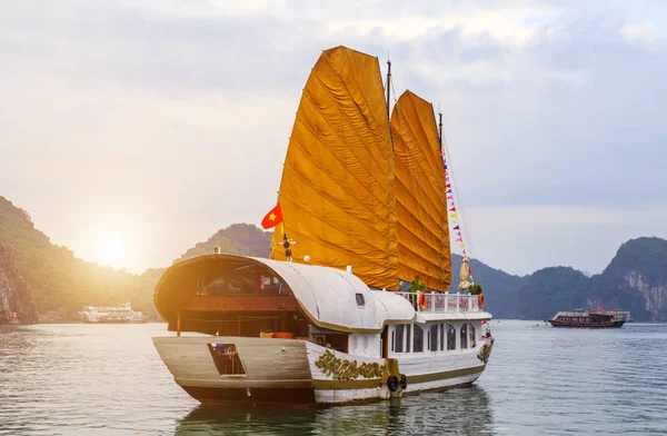 Discover liner Sails golden ship Halong Bay Top Destinations Vie Stock Picture