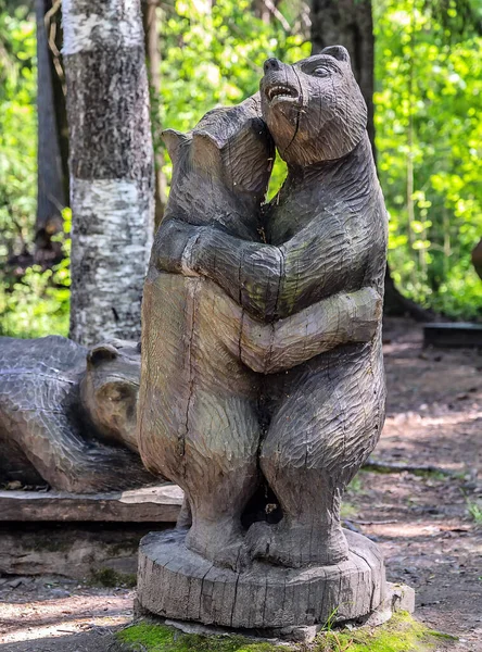 Carving wooden figure tales bear carved wood Statue. Mandrogi Russian Village Karelia Region.