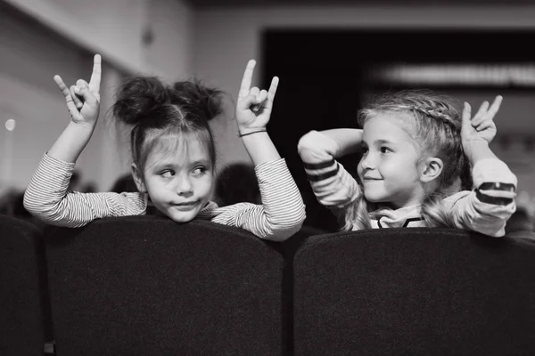 Two Funny Girls Sitting Seats Waiting Children Show — стоковое фото