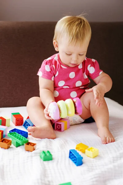 Cute Baby Girl Playing Colorful Plastic Blocks Indoors — Stock Photo, Image