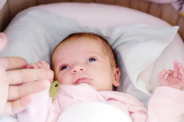 Newborn in crib — Stock Photo, Image