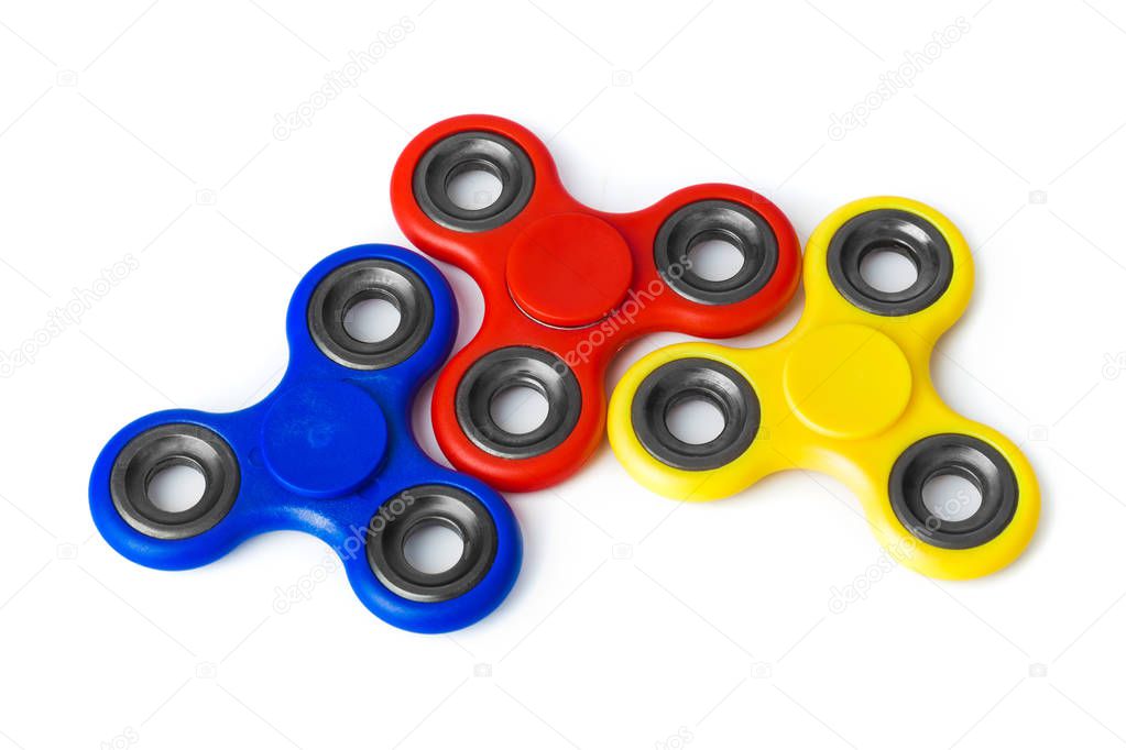 Multicolored spinners isolated on white background