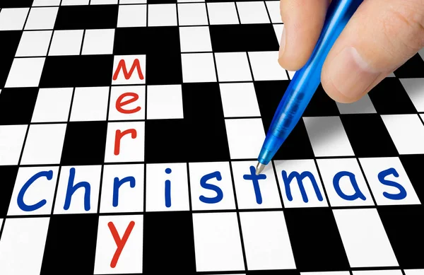 Hand Filling Crossword Merry Christmas Holiday Concept — Stock Photo, Image