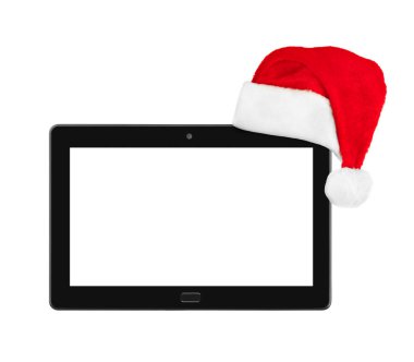 Touchpad bilgisayarı ve Noel Baba kırmızı Noel şapkası beyaz arka planda izole edilmiş.