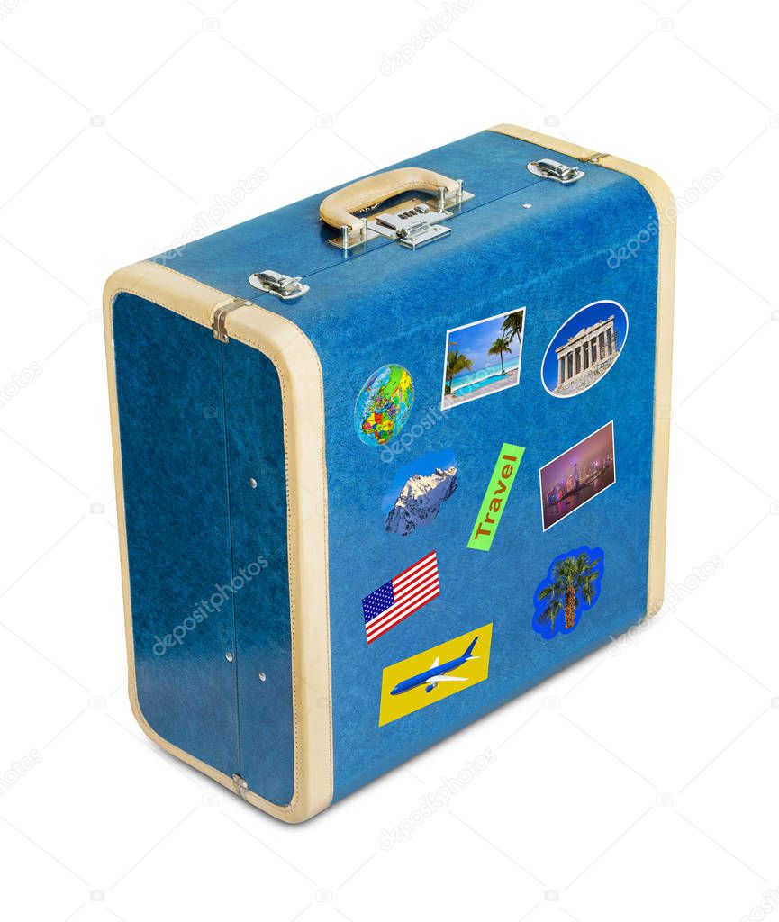 Vintage suitcase with travel stickers isolated on white background