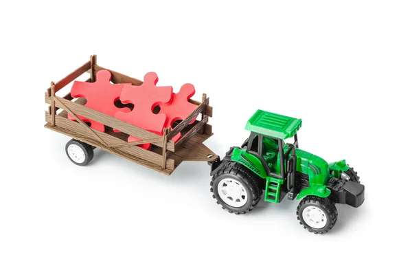 Speelgoed Tractor Met Puzzel Geïsoleerd Witte Achtergrond — Stockfoto