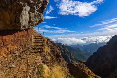Hiking Pico do Arierio and Pico Ruivo - Madeira Portugal - travel background clipart