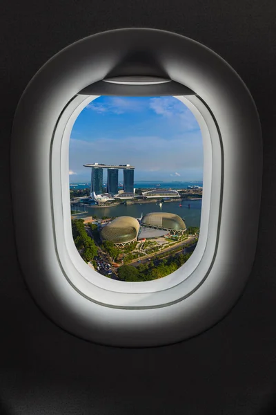 Singapore in airplane window — Stock Photo, Image