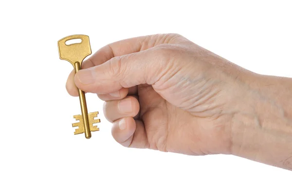 Hand mit Goldschlüssel — Stockfoto