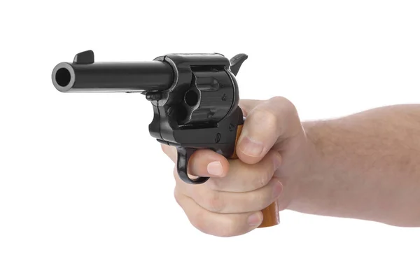 Hand met revolver — Stockfoto