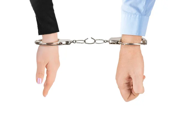 Man and woman hands and breaking handcuffs — Stock Photo, Image